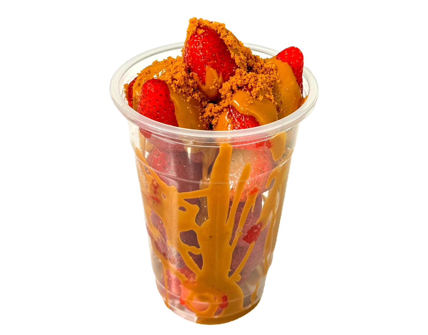 A tall clear cup layered with strawberries, cream and crushed biscuit